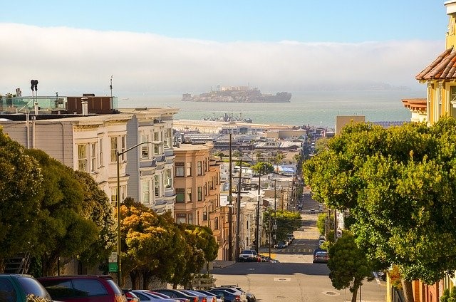 San Francisco street with Alcatraz in background